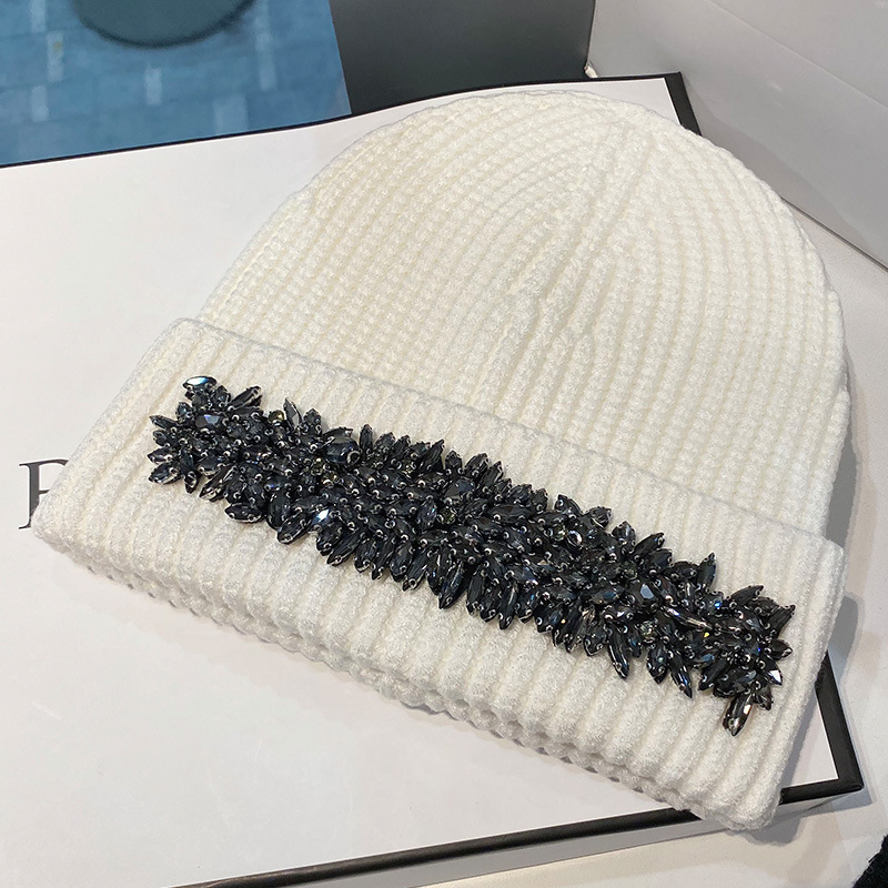 H00020 Vannboredesign strikkede ørehatter